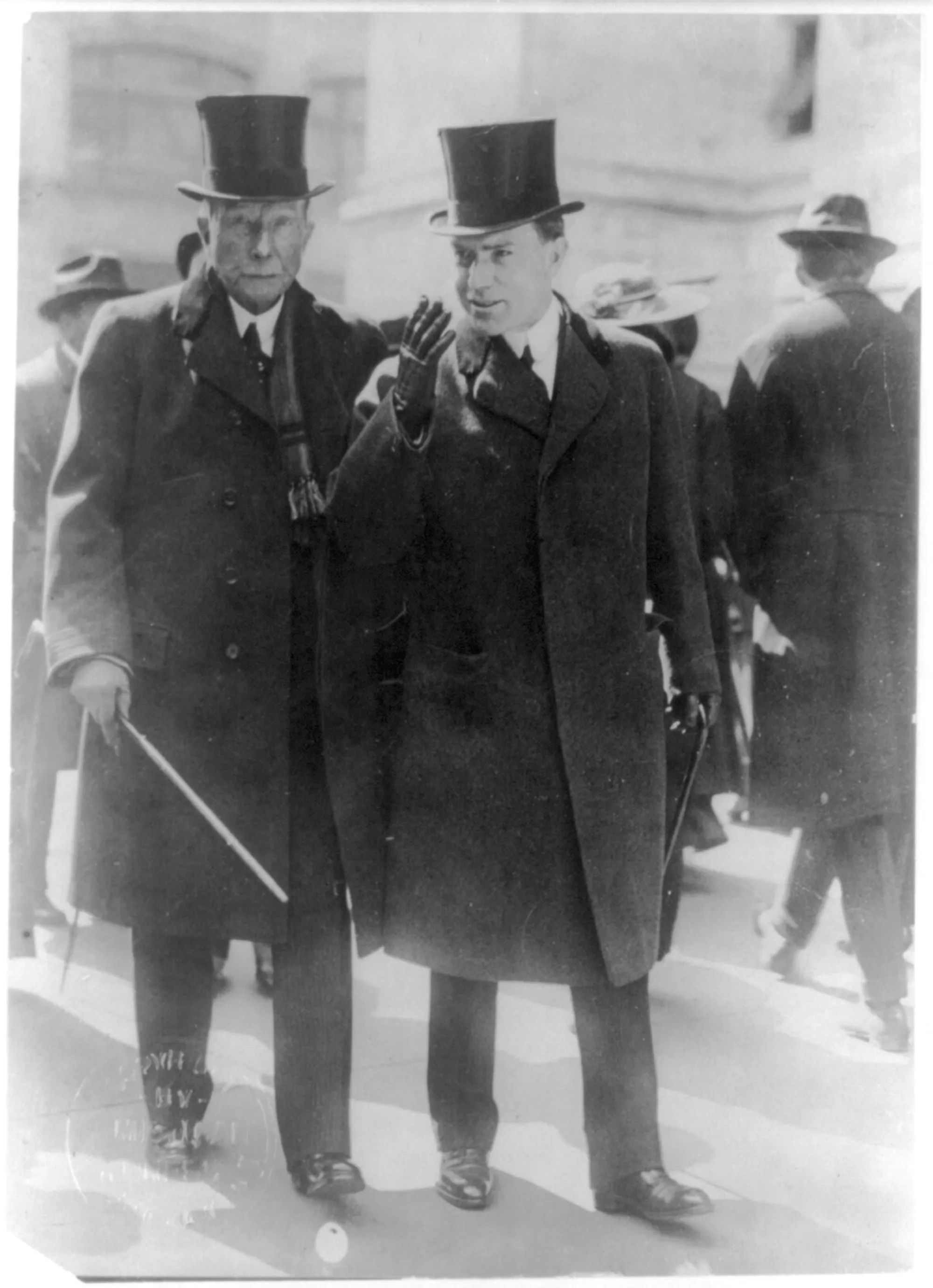 John D. Rockefeller Sr. with his son, John D. Rockefeller Jr.