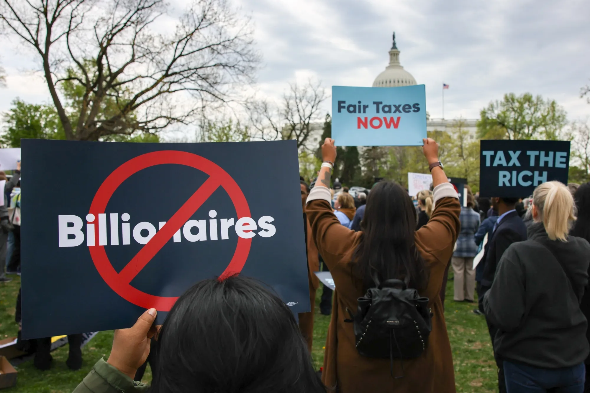 Protesters attend a rally in support of fair taxation